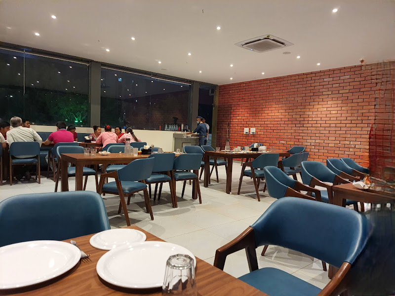 Creamy Spoon Garden Restaurant - best restaurant in Ahmedabad