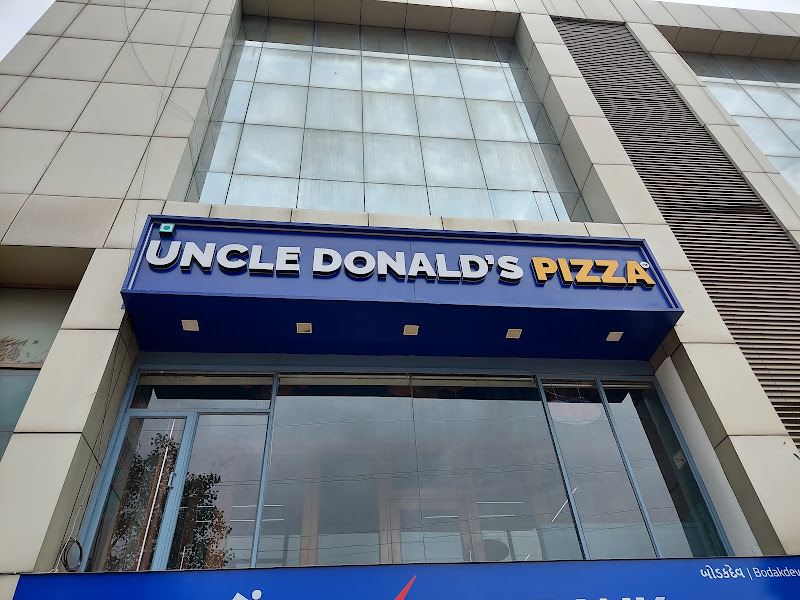 TRIPLE ONE 111 by Uncle Donald PIZZA The Premium Unlimited Pizza Rest